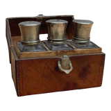 Antique leather case with 3 beveled bottles