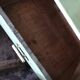 Vintage wooden kitchen cupboard painted green and beige, with glass doors - 1930s