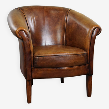 Sheepskin club armchair in good condition