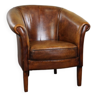 Sheepskin club armchair in good condition