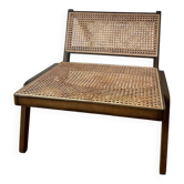 Vintage wooden and cane armchair