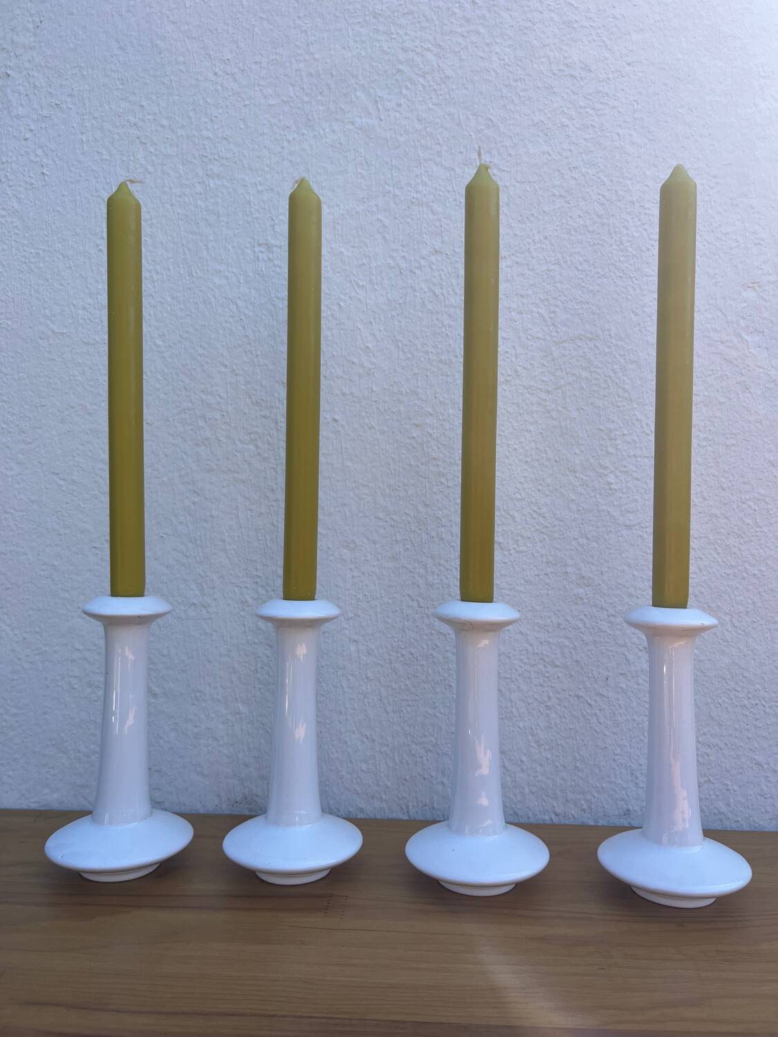 Set of 4 white ceramic candle holders