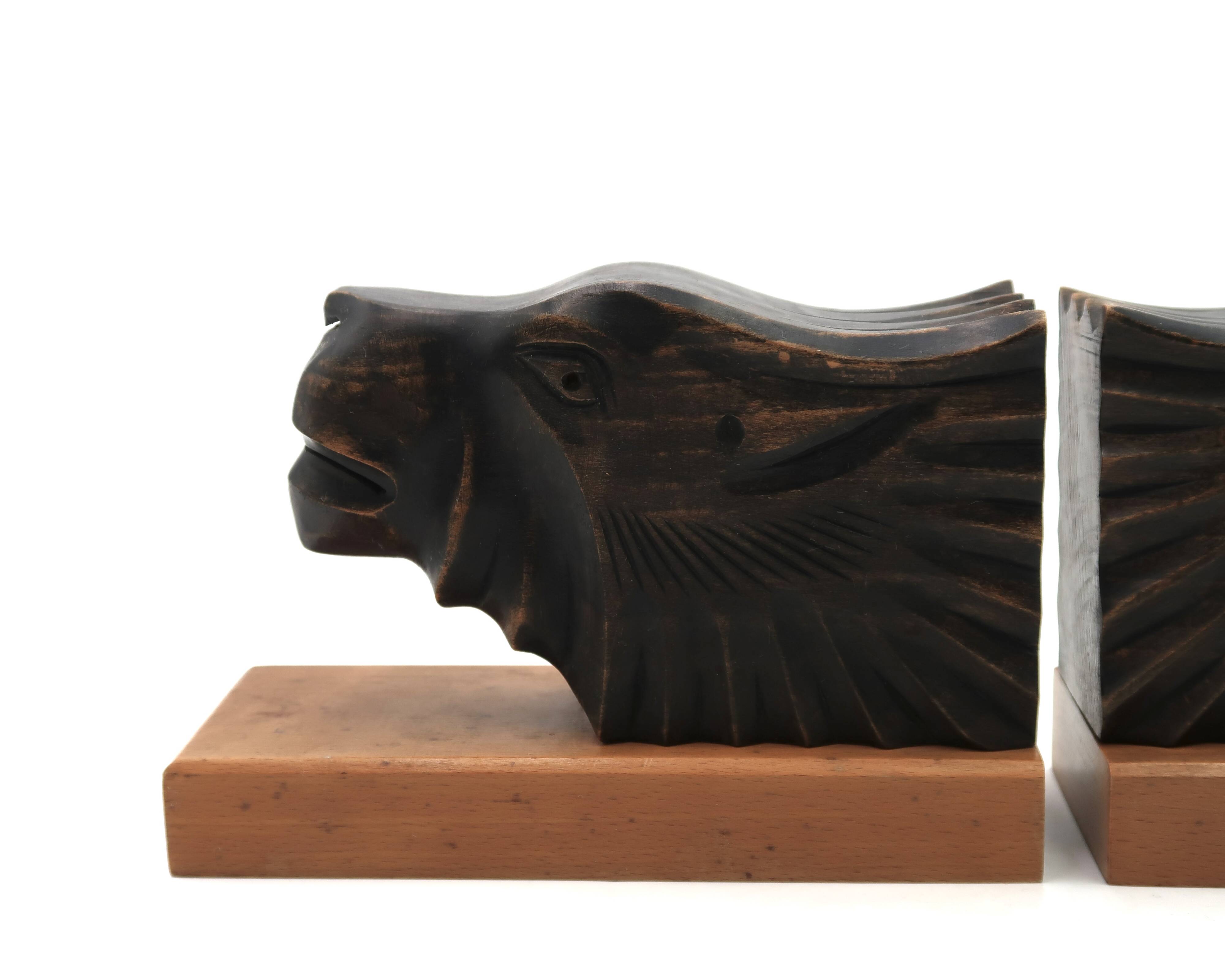 Art Deco wooden bookends with feline heads
