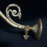 Brass wall lamp with speckled glass tulip