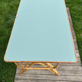 Small vintage rattan desk from the 1960s.