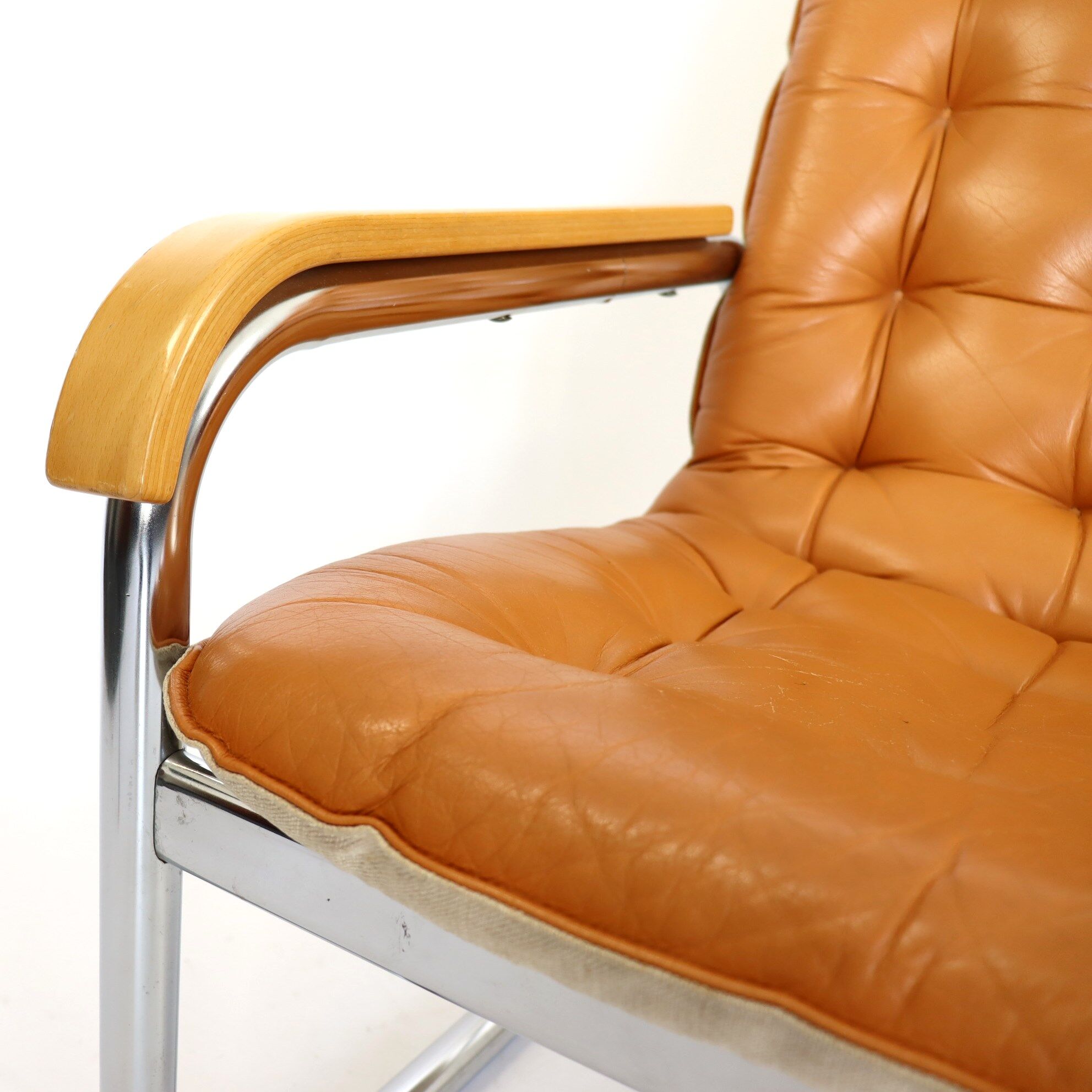 Leather and chrome armchair 70s