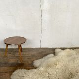 Guerdon small round coffee table brown tripode door plant