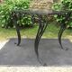 Vintage ceramic coffee table by Guy Trévoux with wrought iron base.