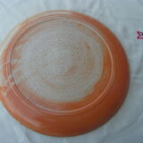 Round dish in gres a decor of leaves sign in calcat
