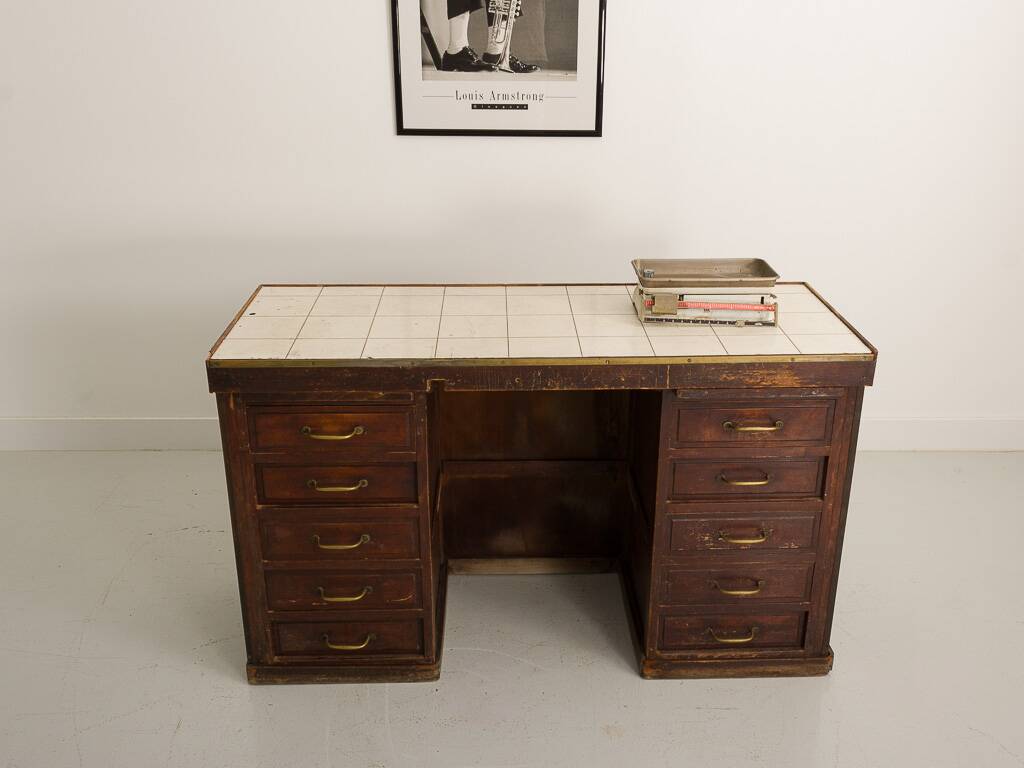 Small vintage stained wooden countertop with 2 shelves and 10 drawers