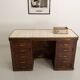 Small vintage stained wooden countertop with 2 shelves and 10 drawers