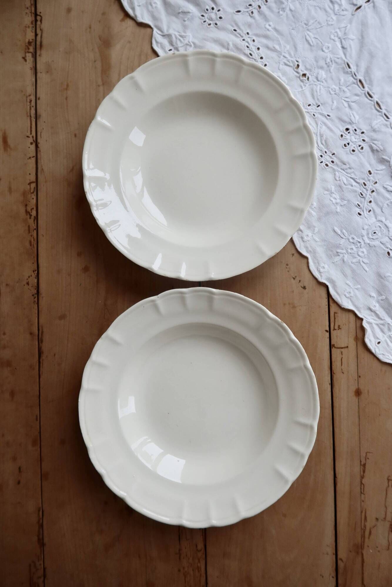 Pair of antique ivory faience deep plates ADP Luxcerae