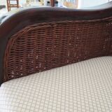 Vintage colonial-style armchair in woven rattan and exotic wood