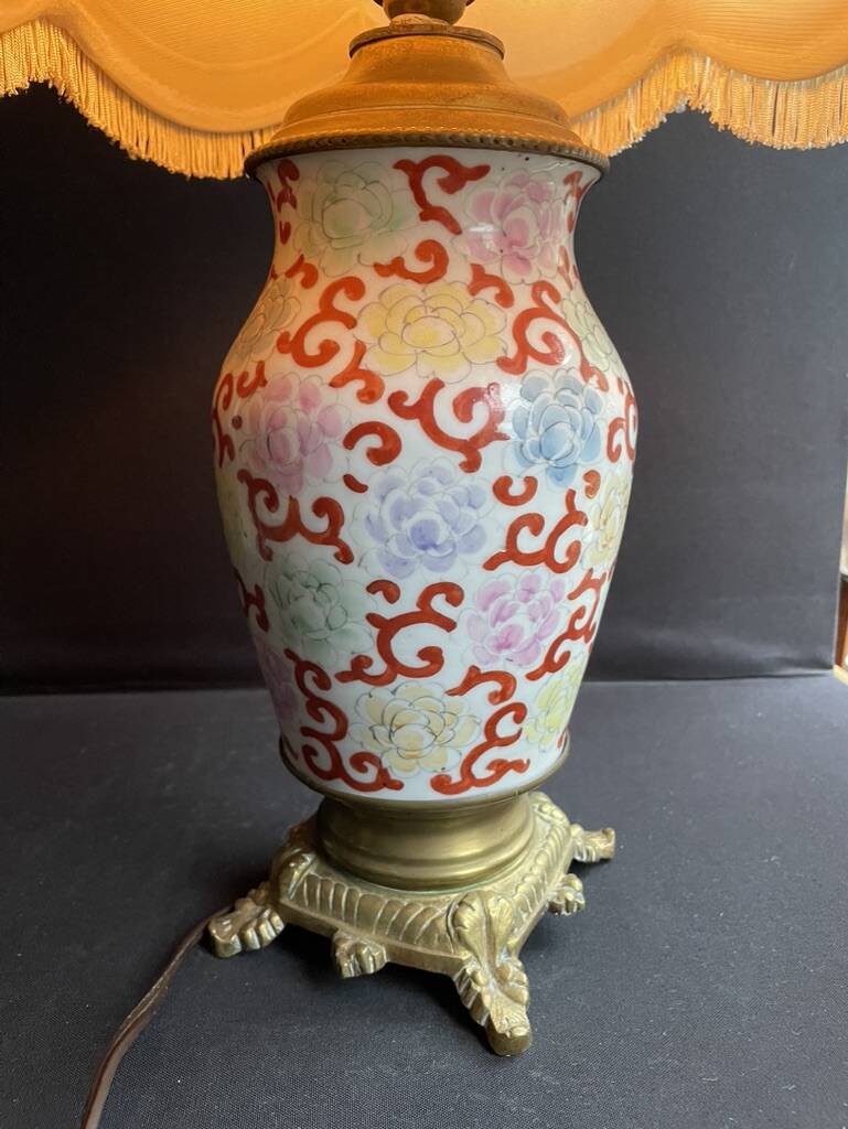 Old Asian vase mounted as a lamp with pagoda lampshade