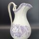 Large antique toilet bowl by Jules Vieillard Bordeaux with violet floral decoration.