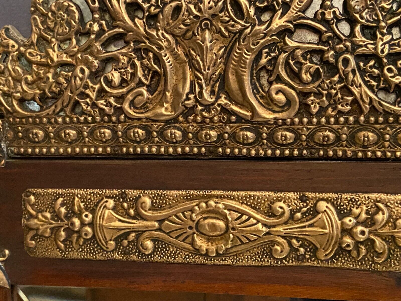 Mirror pediment nineteenth Neo classical decoration antique character brass on wood