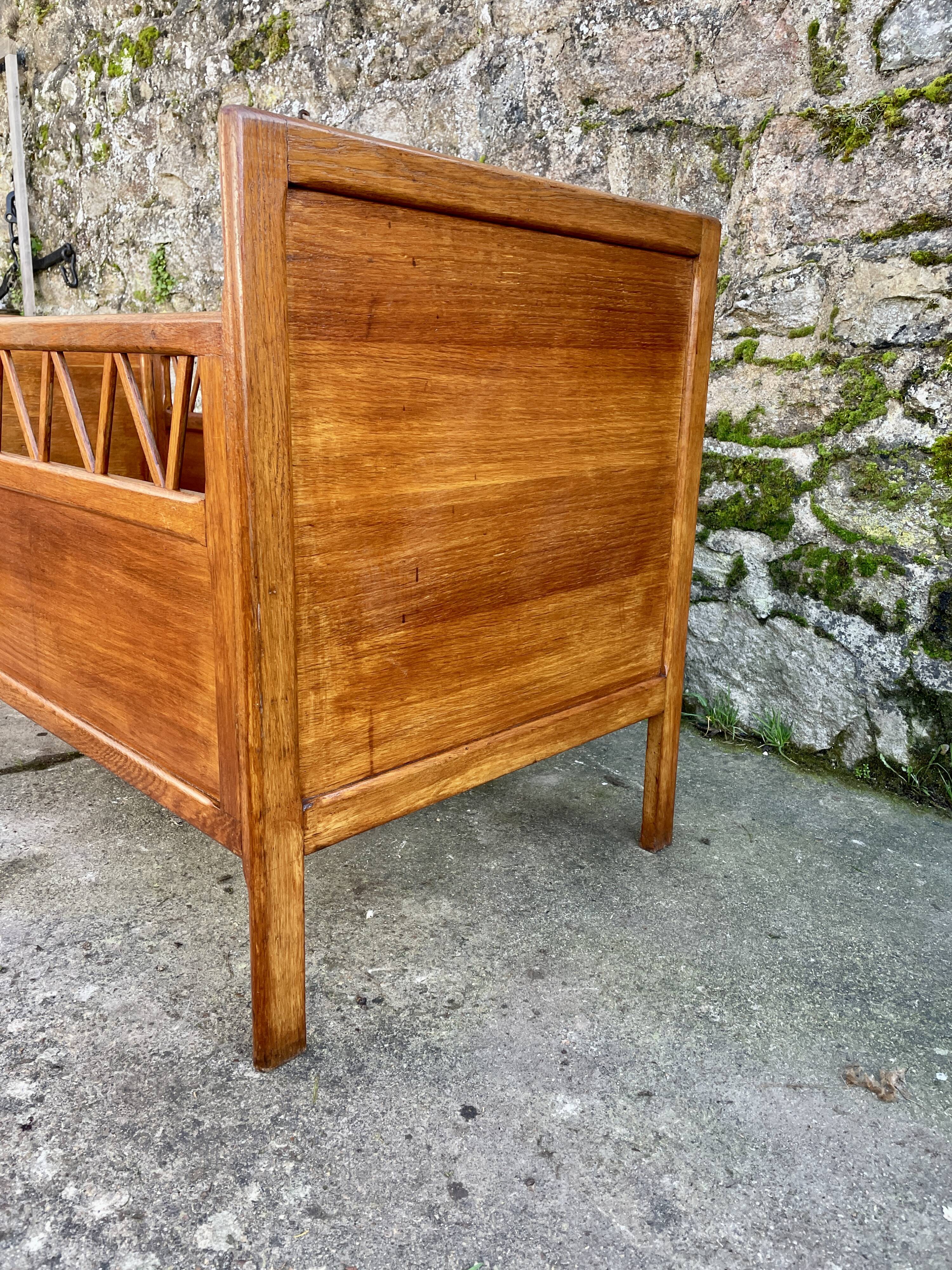 Handmade children's bed with compass feet 1950