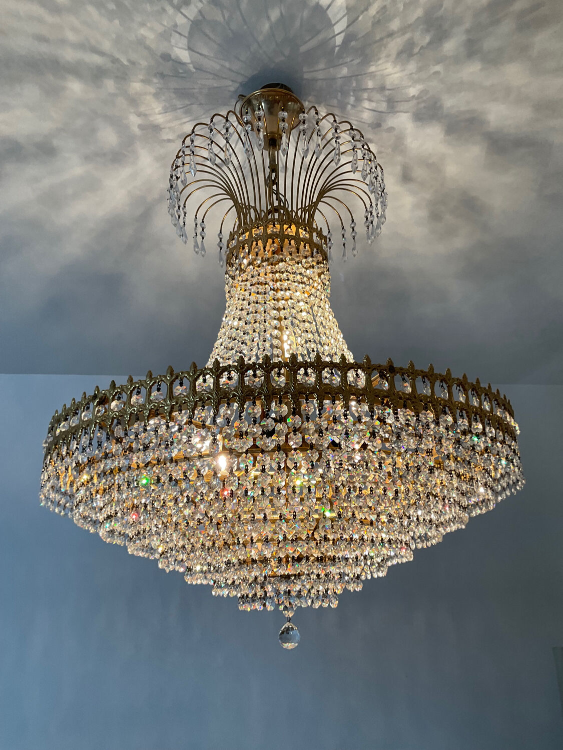 Brass chandelier and crystal tassel waterfall