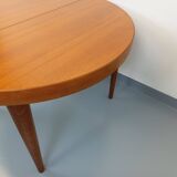 Large vintage Scandinavian round table from the 50s 60s in teak with extensions