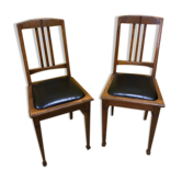 Paire de chaises art deco assise skaï noir