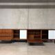 Enfilade buffet display cabinet in vintage 1950s style.