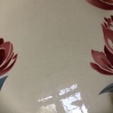 Round hollow earthenware dish