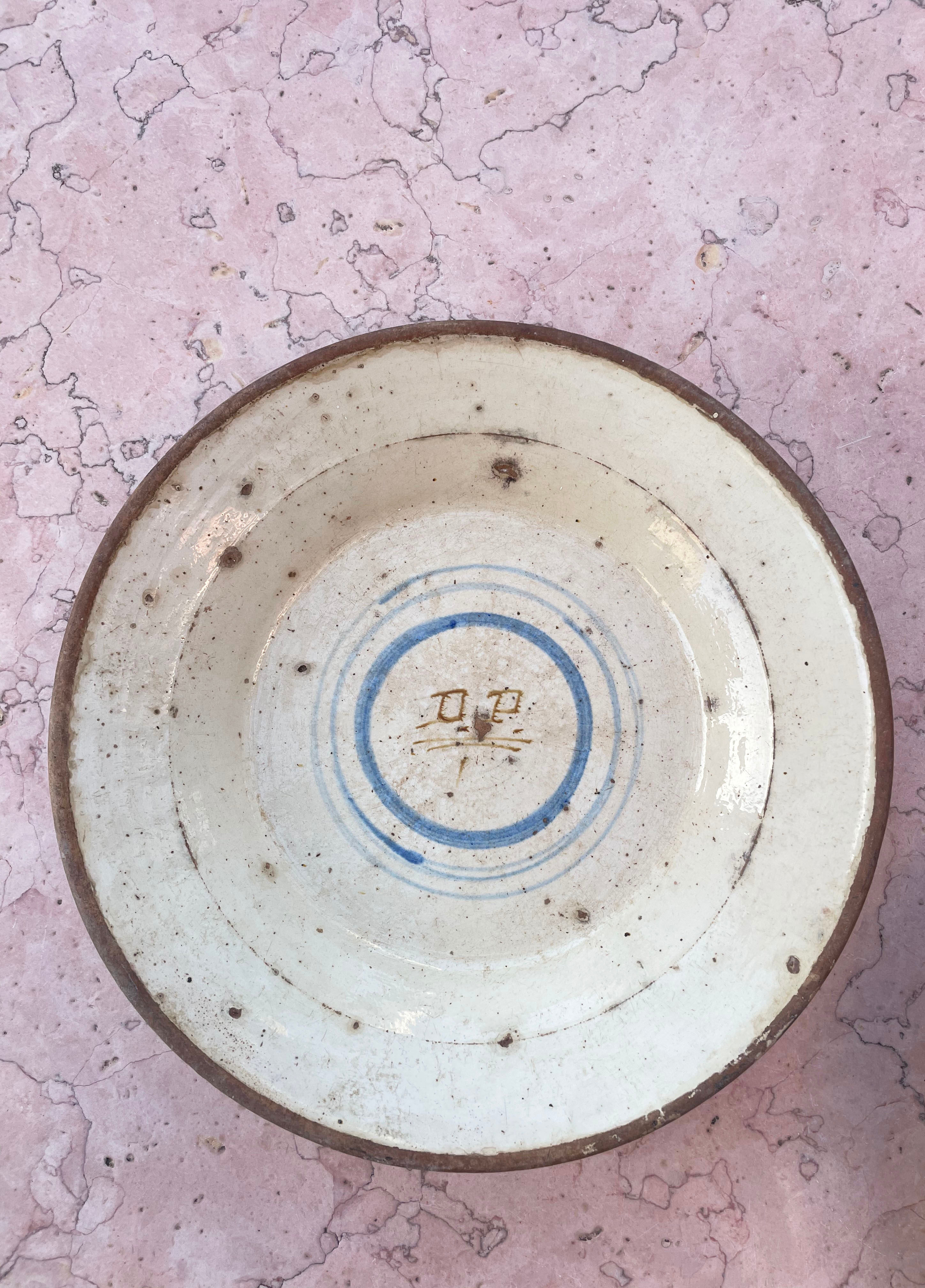 Initialled terracotta bowl