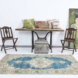 Tapis persan bleu et beige