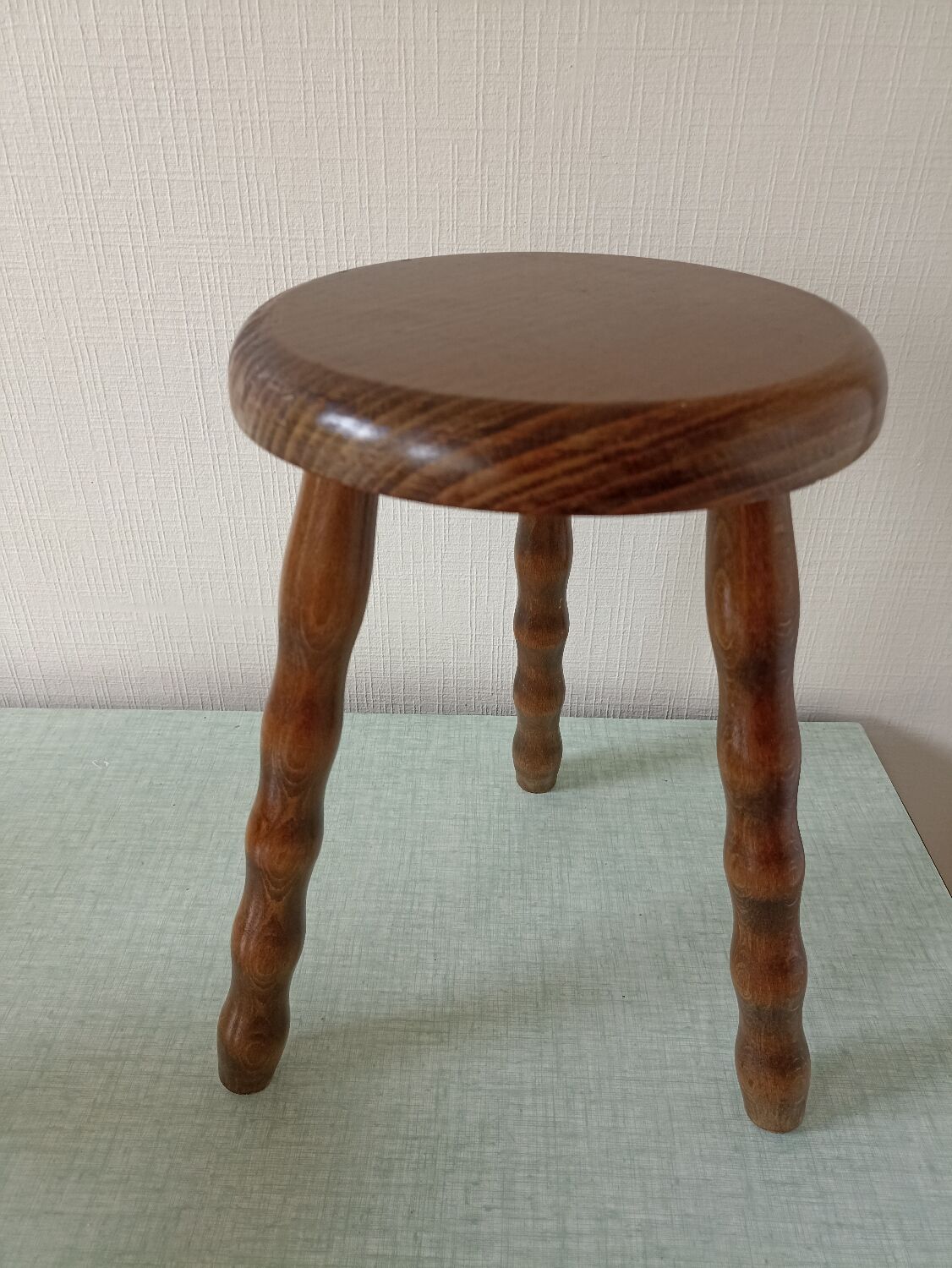 Tripod stool. Twisted feet turned by hand.