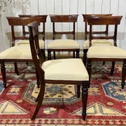 Set of 2 armchairs and 6 English mahogany chairs from the 1950s.
