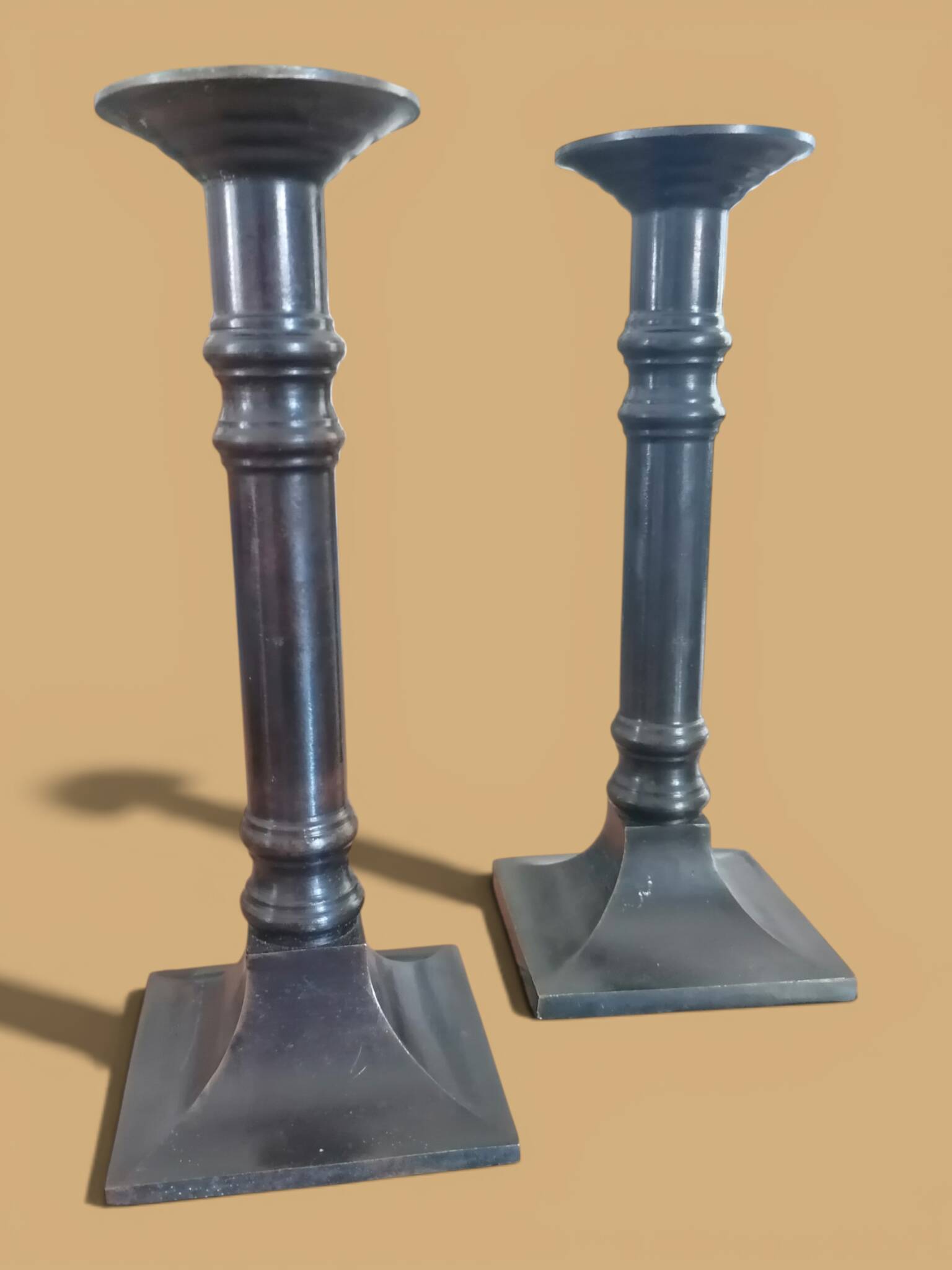Pair of patinated bronze candlesticks Dutch Brustalistes
