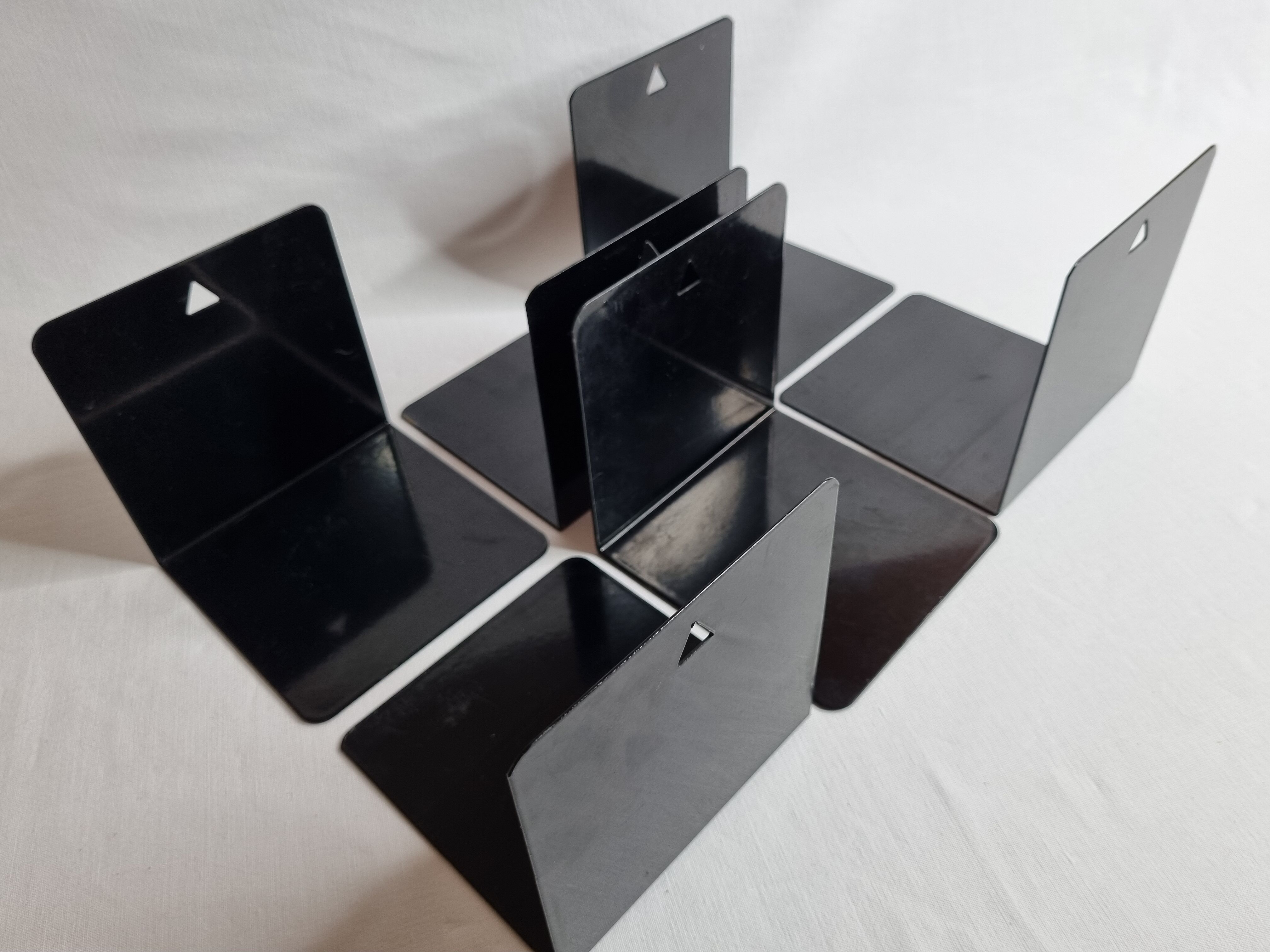 Set of six vintage black lacquered steel bookhouses