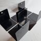 Set of six vintage black lacquered steel bookhouses