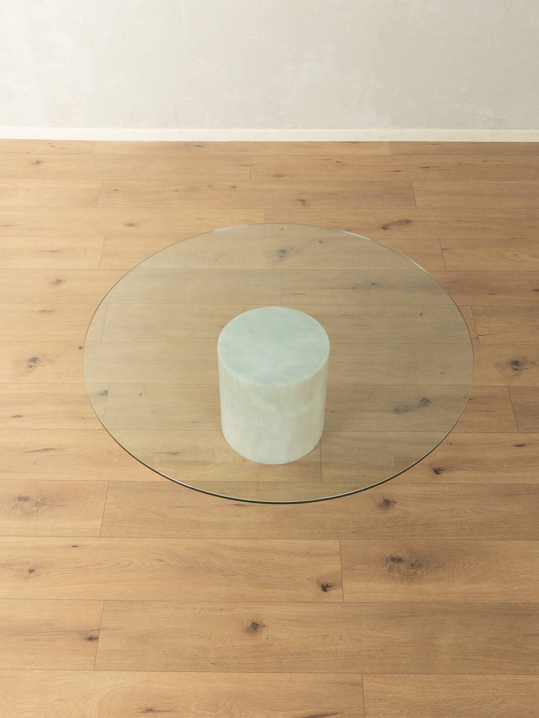 Postmodern coffee table from the 1980s with marble base and glass top