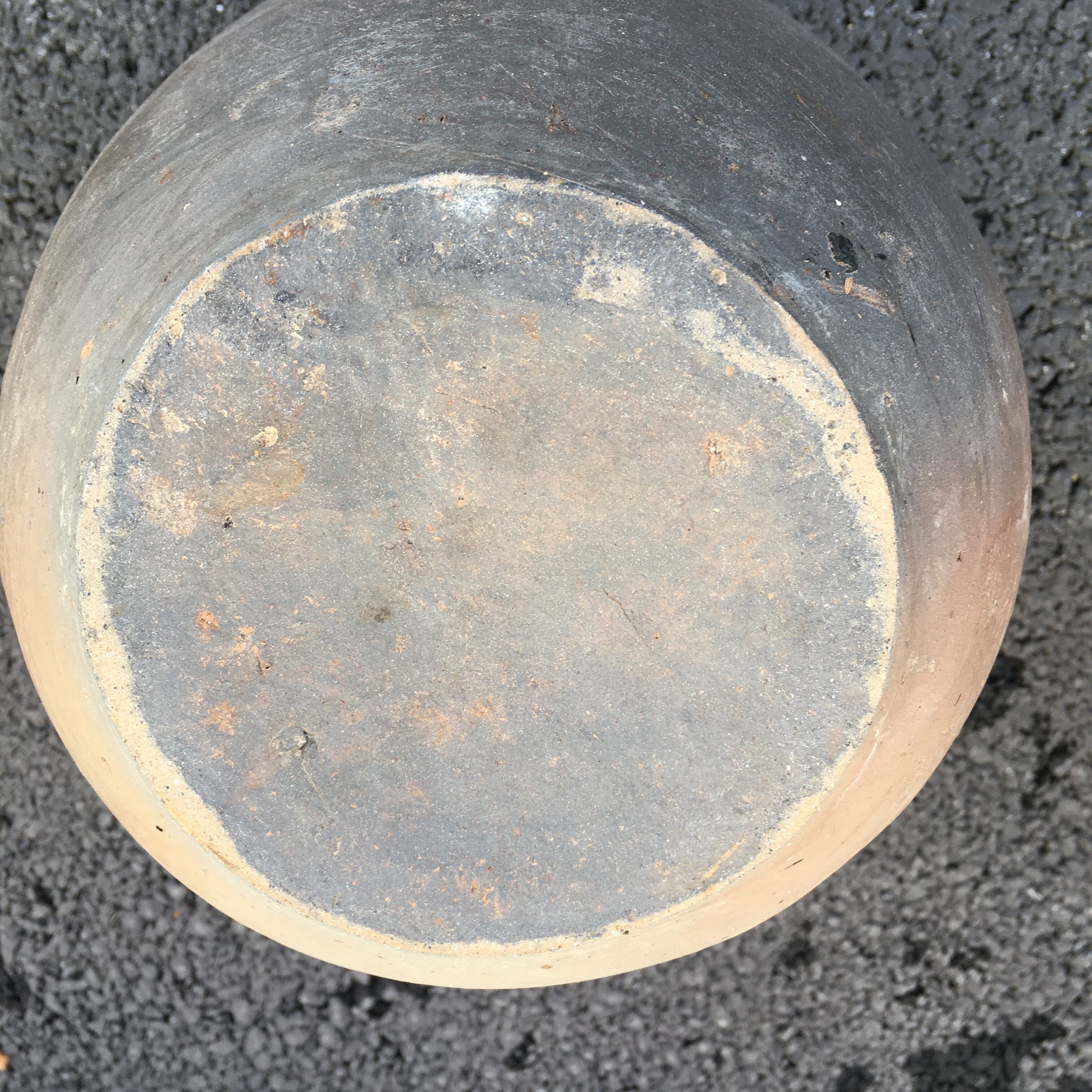 Old jug with two sandstone handles