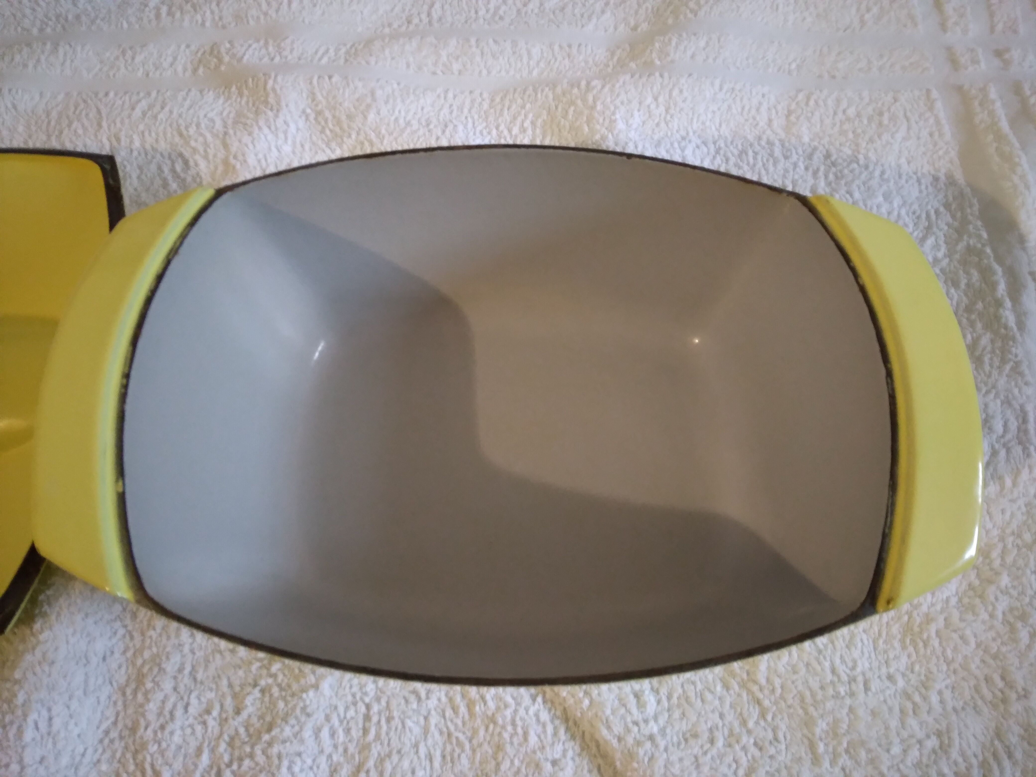 The Creuset cocotte Raymond Loewy enamelled yellow and 2 pans