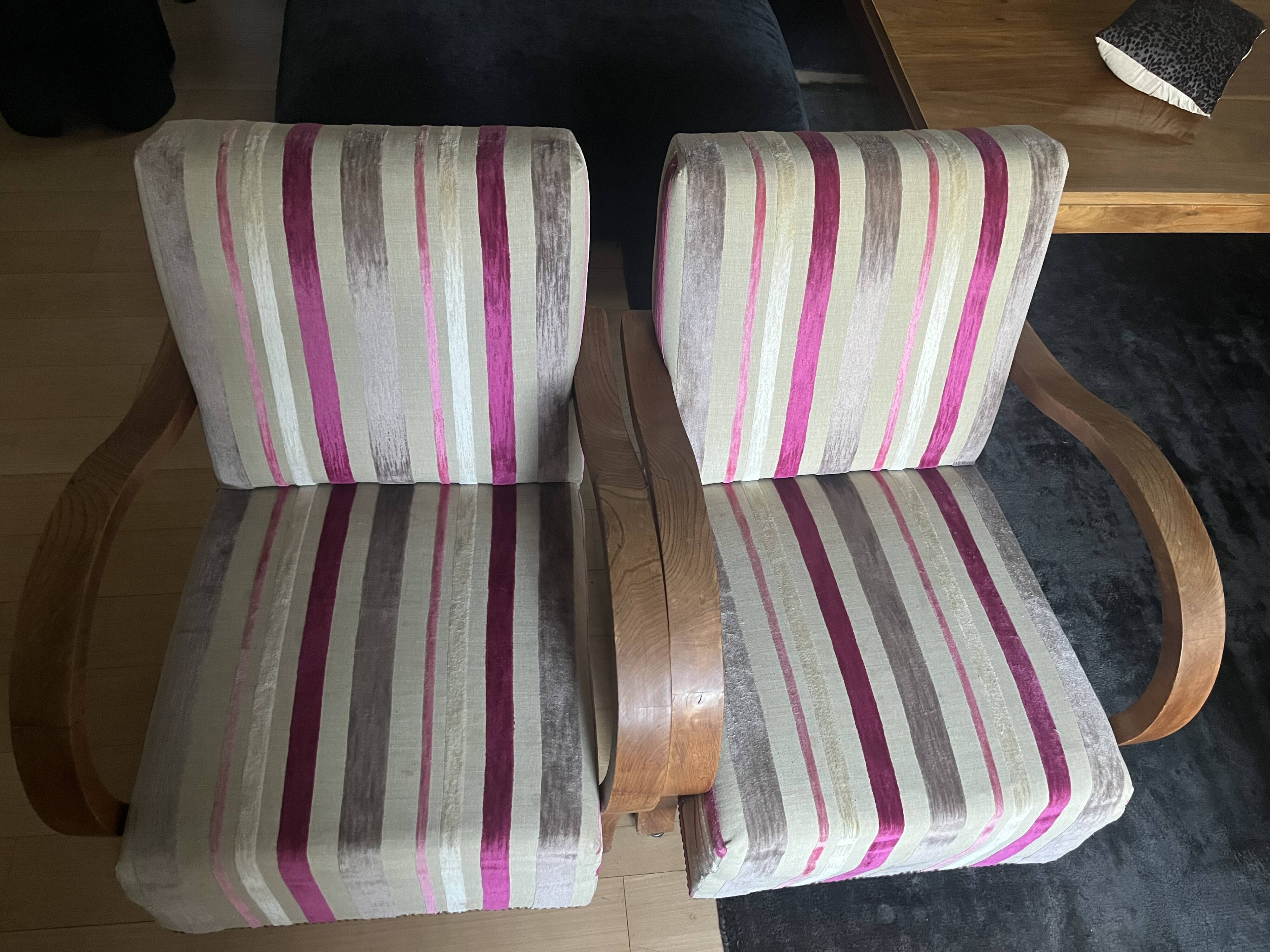 A pair of Art Deco armchairs in very good condition.