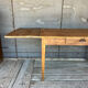 Old raw wood table with extension