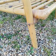 4 bamboo armchairs and a vintage coffee table