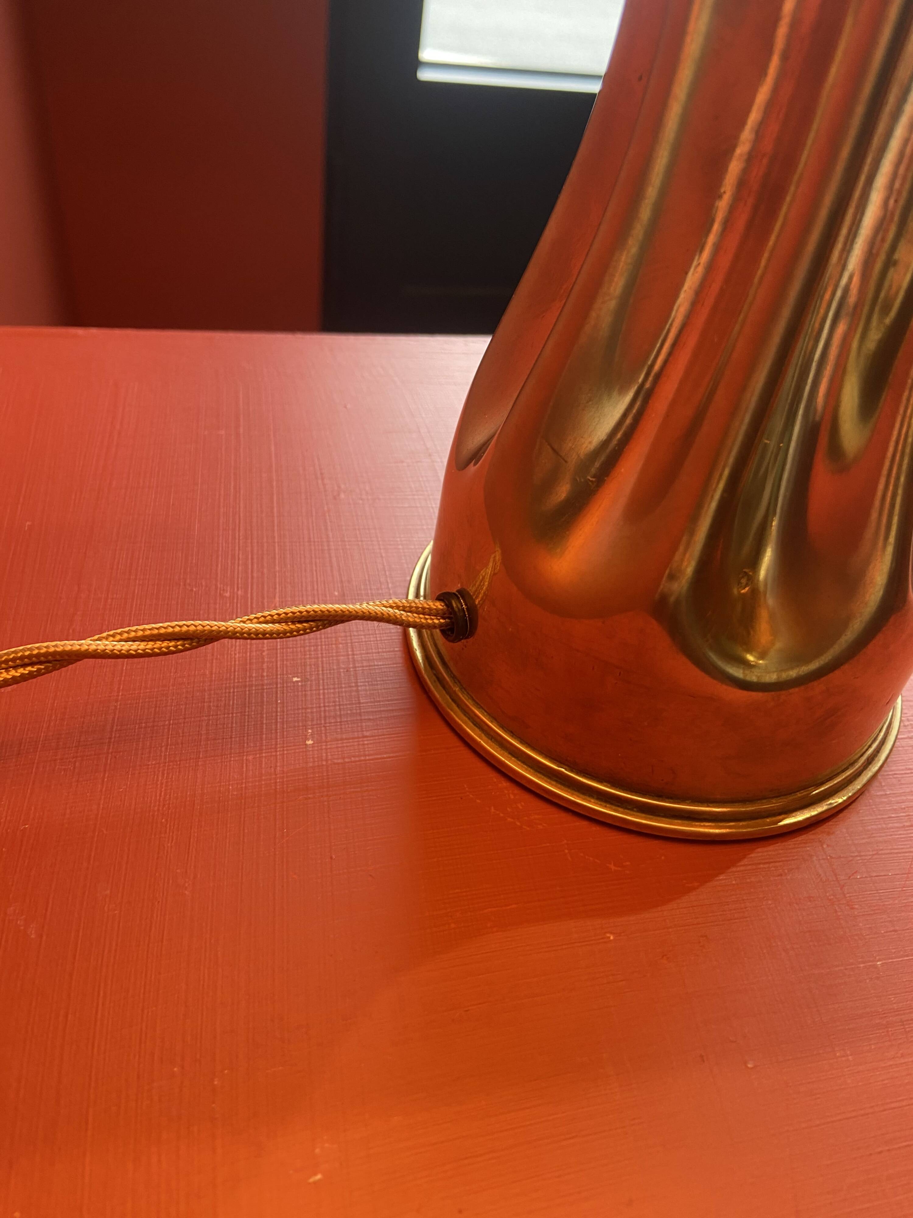 Brass shell socket lamp from the 1st WW, black pyramidal lampshade in Carlucci linen.