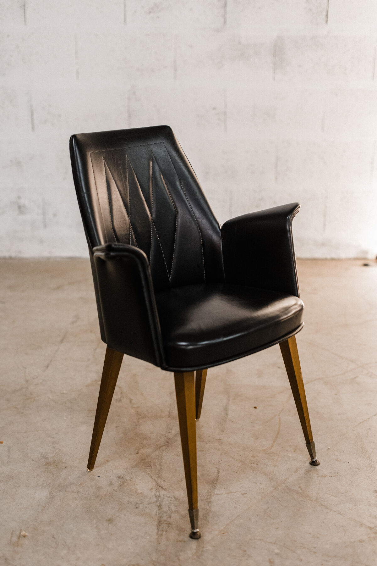 Armchairs / chairs in black skaï "emelinne"