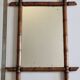 Miroir mural Napoléon III en bois tourné façon bambou XIXe siècle, 49x65 cm