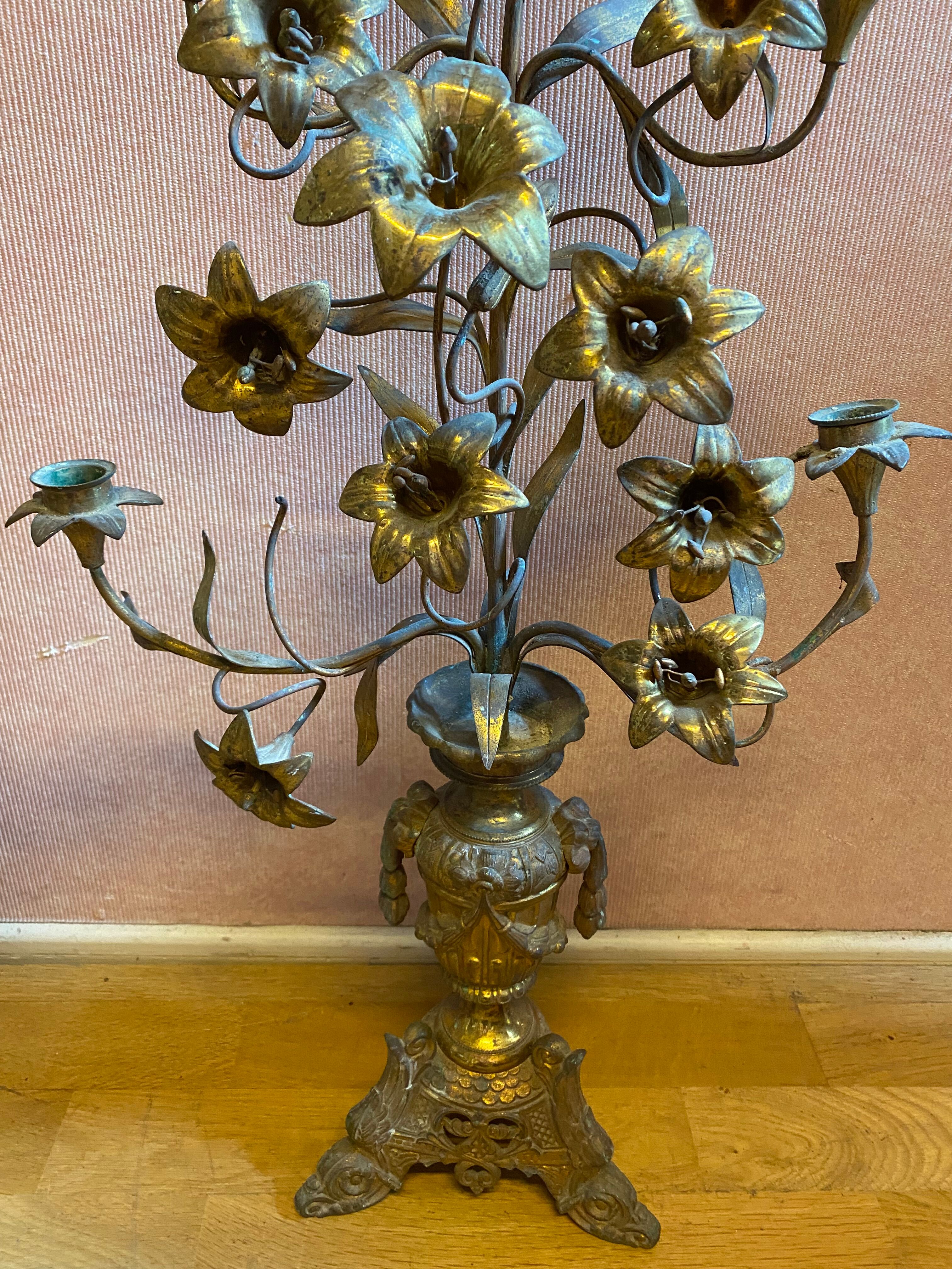 Pair of gilded bronze church candelabras.