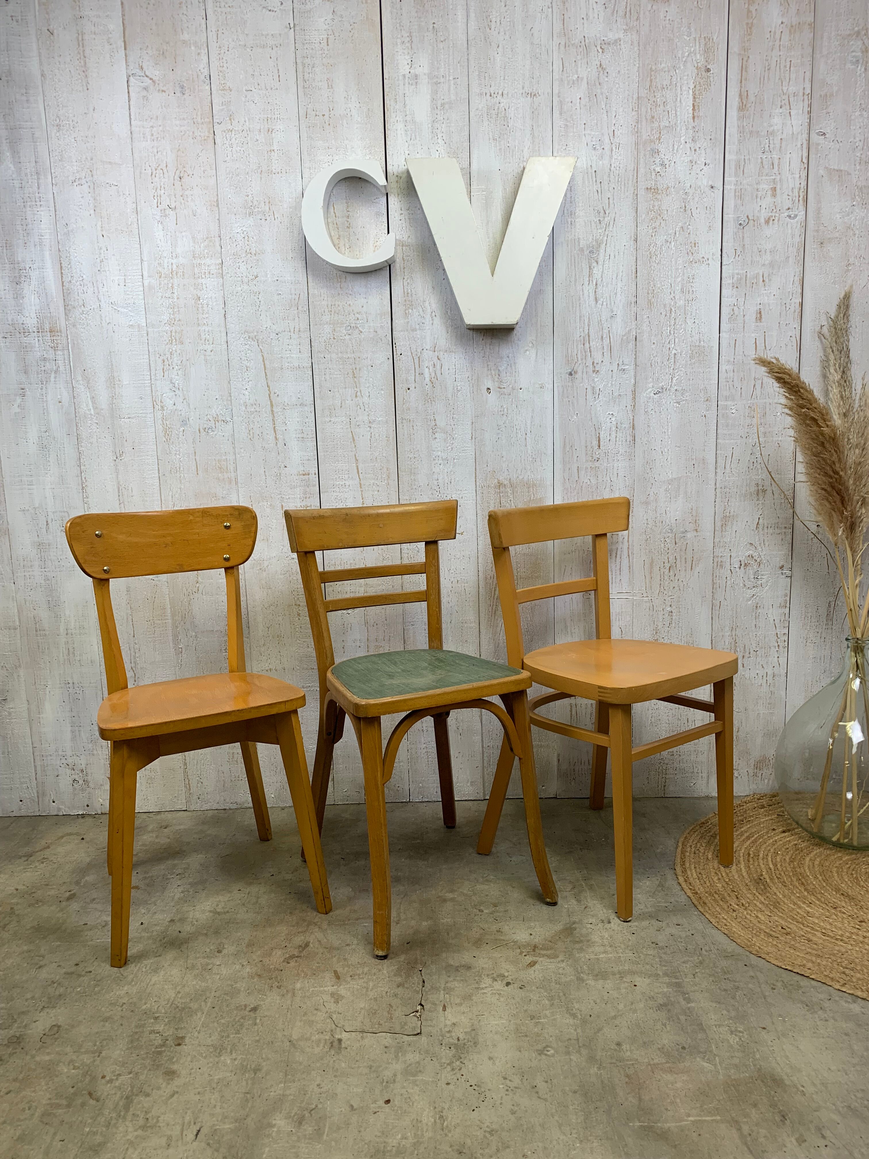 Lot 3 mismatched bistro chairs