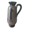 Old Breton pitcher in glazed sandstone. Signed BREIZH UM 6 .