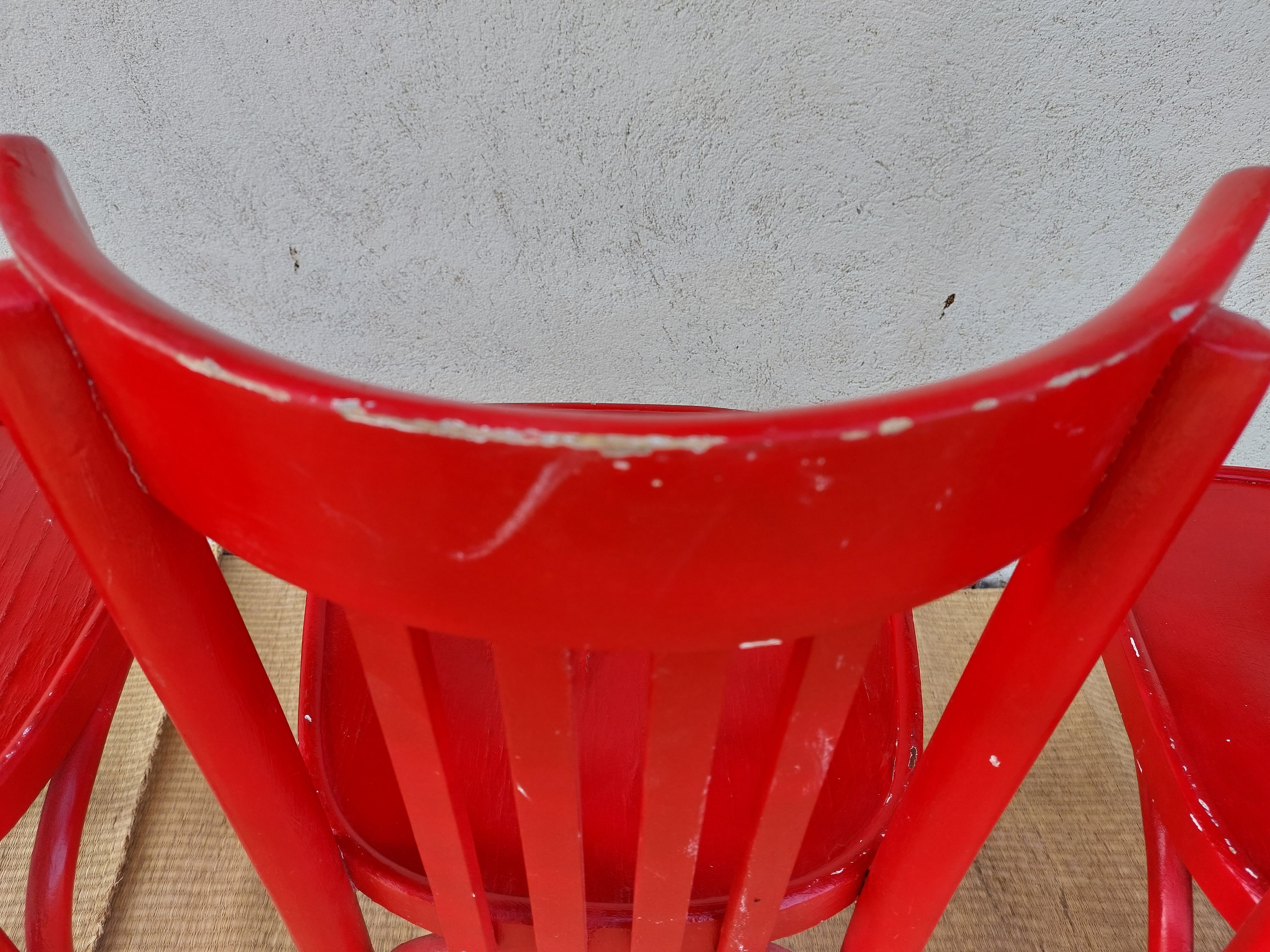 Red baumann chairs