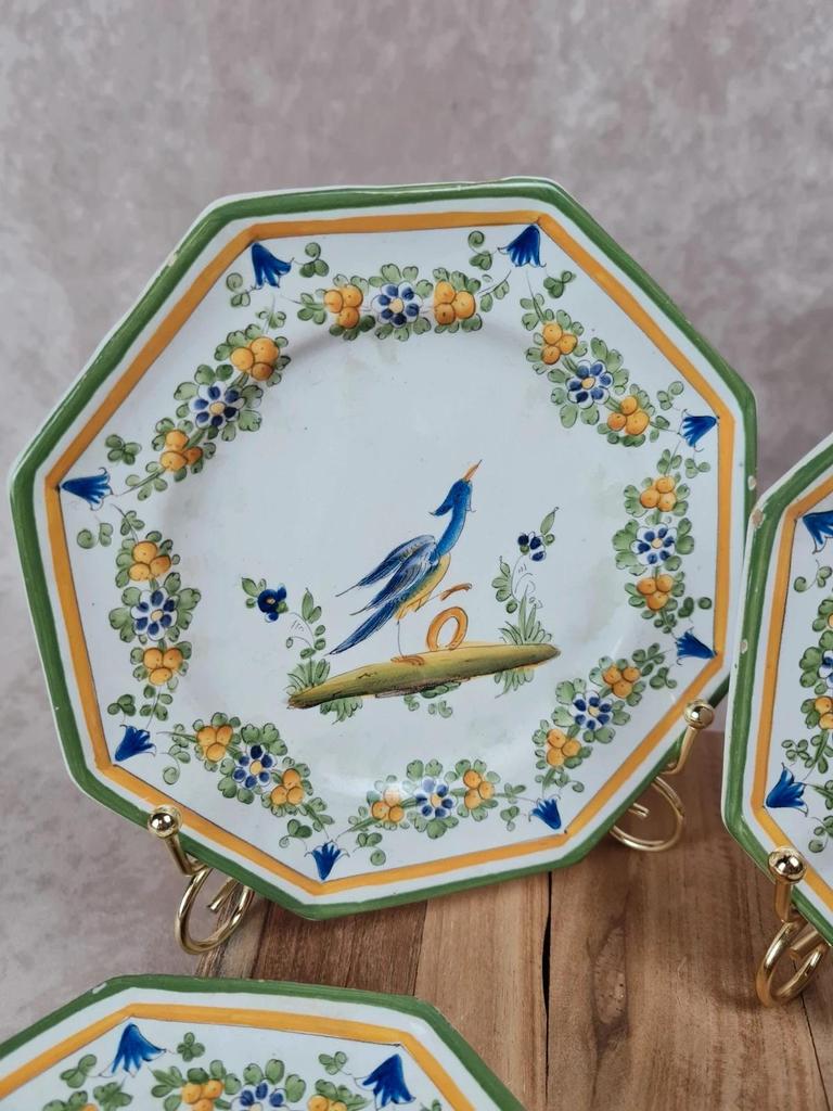 Set of 12 small antique plates by Alfred Renoleau, different designs.