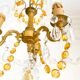 Small vintage brass chandelier with amber crystal pendants.