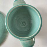 Earthenware bowl and saucer in glazed water green ceramic.