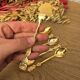 Golden metal spoons